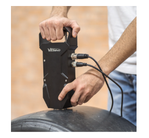 VESevo device in operation for non-destructive testing of a high-performance tire tread compound